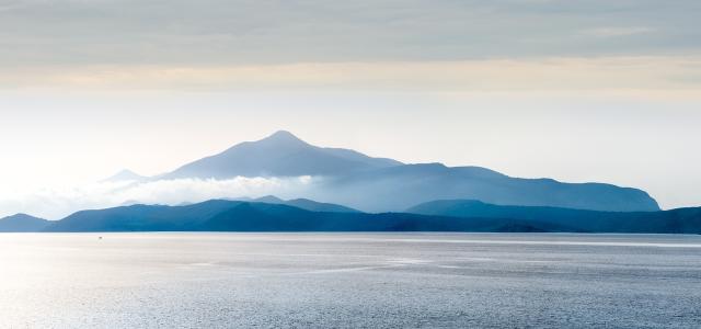 Mountain island in the sea panorama