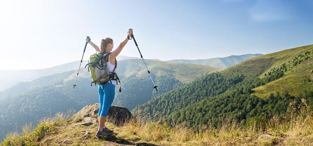 Young woman hiking in the mountains